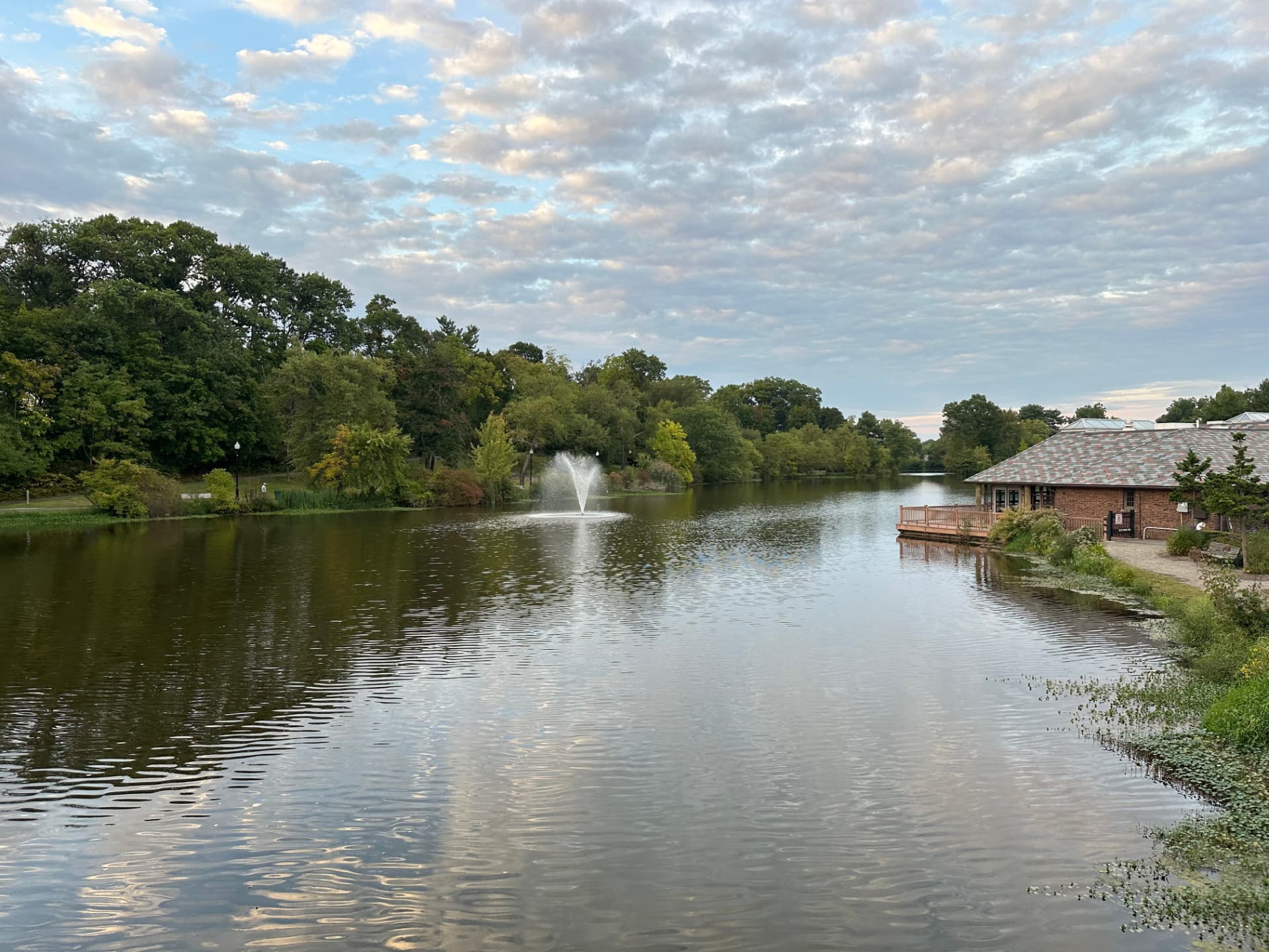 Verona Park lake with fountain at sunset
